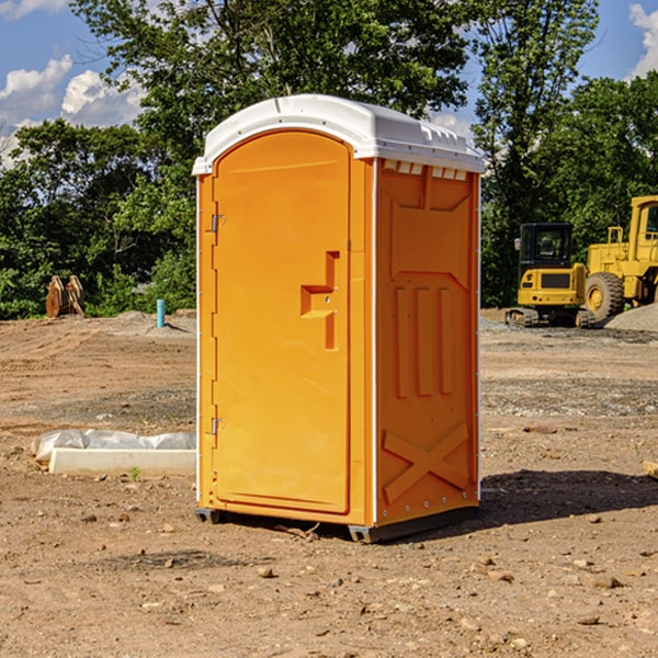 how often are the porta potties cleaned and serviced during a rental period in Waumandee